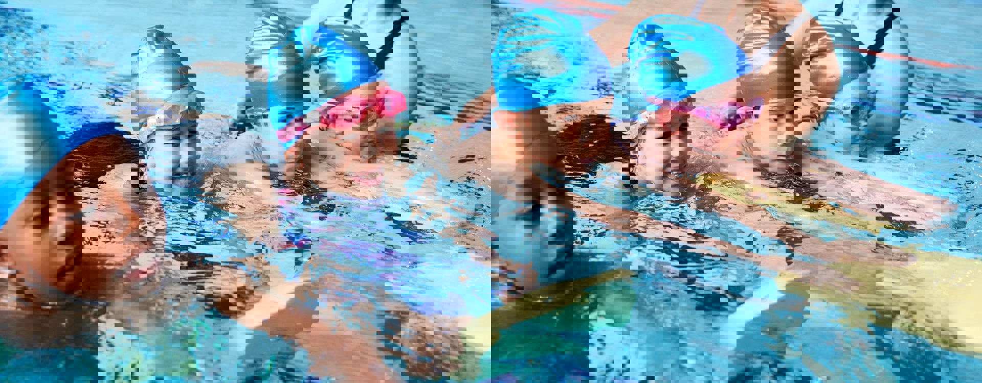 Children in a swimming lesson